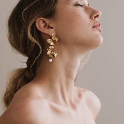 pastel-maison-sabben-pearl-earrings- statement-gold-floral-earrings-with-a-pearl-suspended-from-the-bottom.